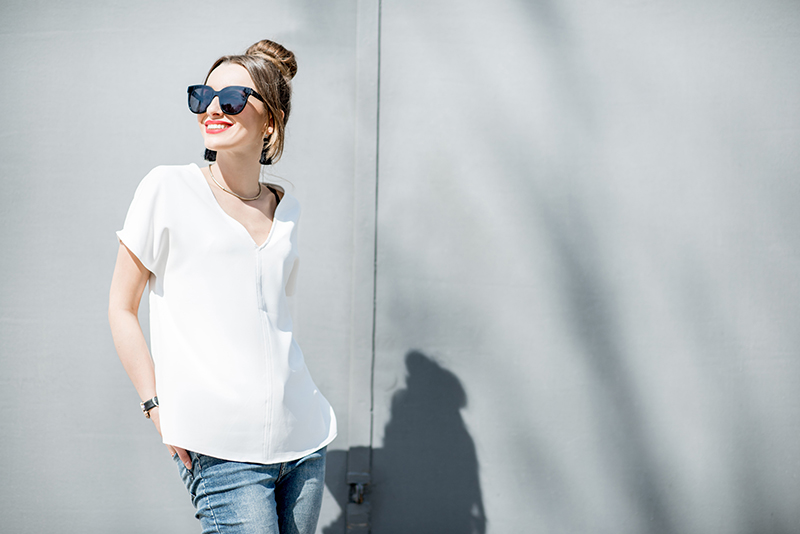 Woman smiling with sunglasses